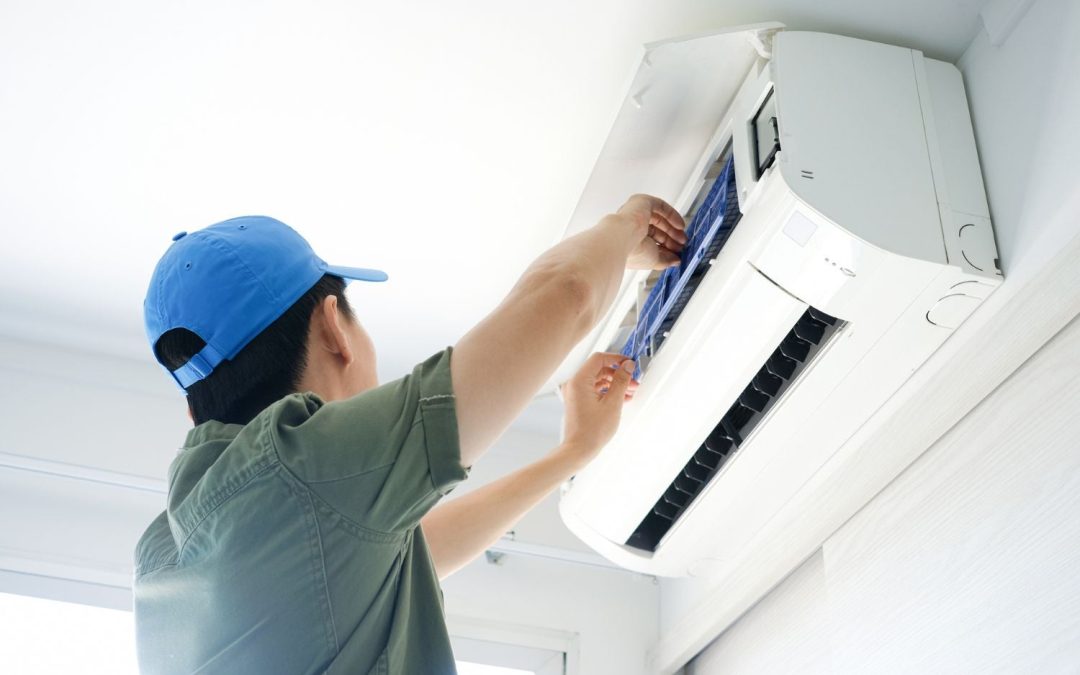 HVAC technician servicing a ductless mini split in Lomita